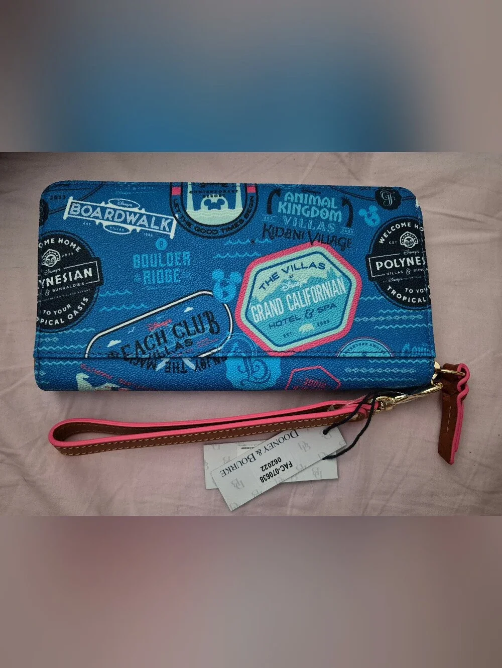 NWT Dooney & Bourke Disney Blue Graphic Zip Wallet with Wristlet Strap